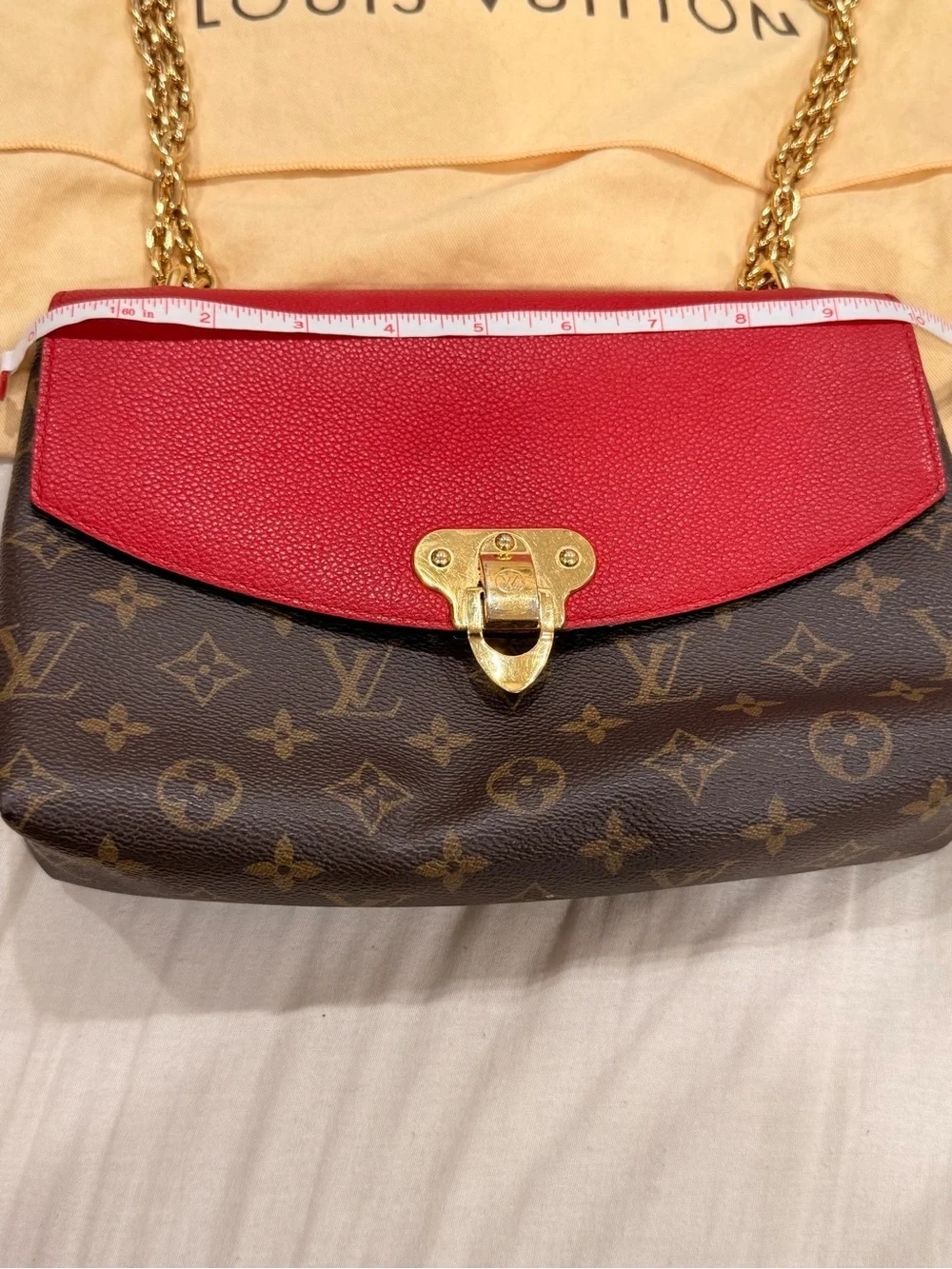 Louis Vuitton Saint Placide brown monogram with red trim